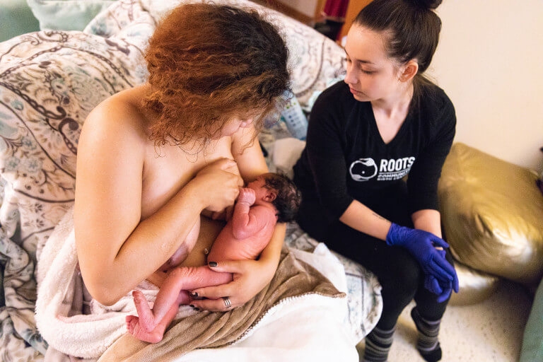 ashley breastfeeding with lactation consultant